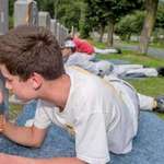 image for These Belgian kids are doing a restoration on the graves of ww1 soldiers.