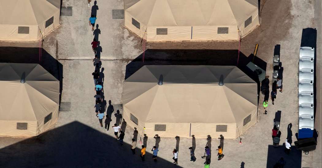 image for Migrant Children Moved Under Cover of Darkness to a Texas Tent City
