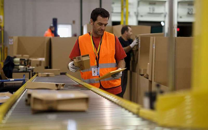 image for Amazon's hourly workers lose monthly bonuses and stock awards as minimum wage increases