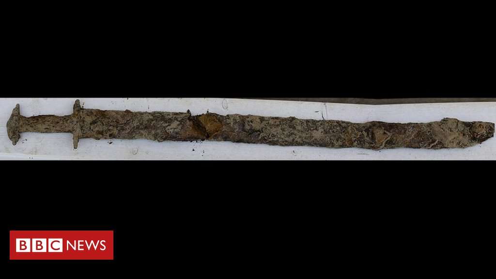 image for Girl, 8, pulls a 1,500-year-old sword from a lake in Sweden