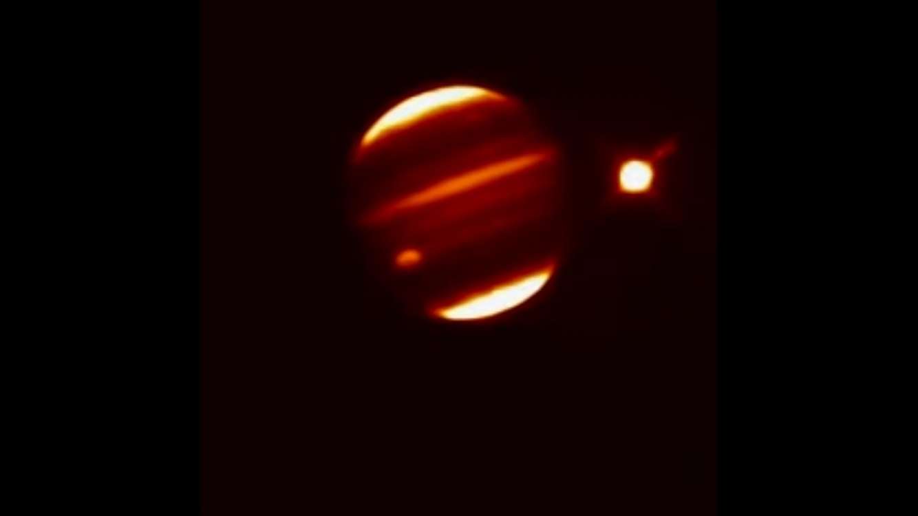 image for The small flash was a explosion caused by the comet Shoemaker-Levy 9 that collided with Jupiter. The explosion had the force of 5 billion atomic bombs and twice the size of Earth : space