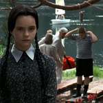 image for Addams Family Values (1993), a movie full of sight gags and one-liners, had one I completely missed until today: Pugsley attempting to hang himself shortly after arriving at Camp Chippewa. It's on screen for 2 seconds (00:22:25).
