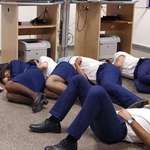 image for This is a Ryanair 737 crew based in Portugal, stranded in Malaga, Spain a couple of nights ago due to storms. They were forced to sleep on the floor of the Ryanair crew room because Ryanair didn't care to book them a Hotel room.