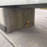 image for Tape measure embedded in concrete