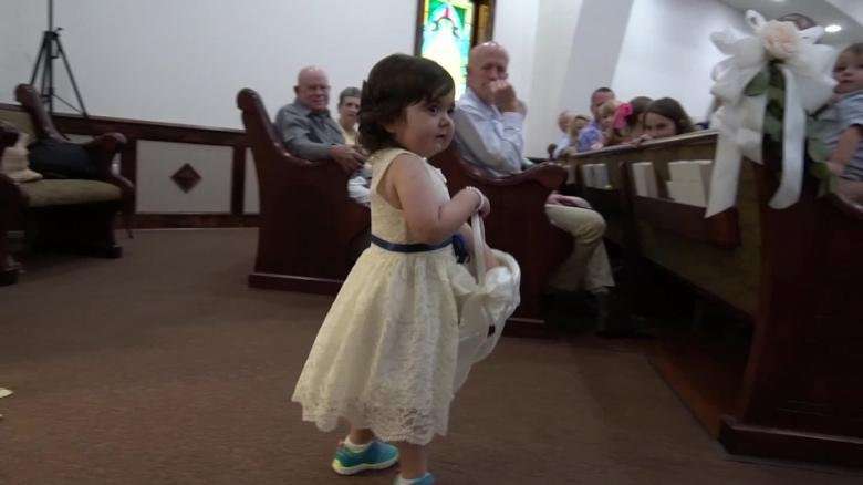 image for 3-year-old cancer survivor serves as flower girl in her bone marrow donor’s wedding