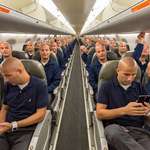 image for This guy found himself on an empty airplane so he took a picture of himself in every seat and photoshopped them together