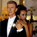 image for David Bowie with his new wife Iman at their wedding in 1992