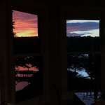 image for This sunset looked split in half through my two windows