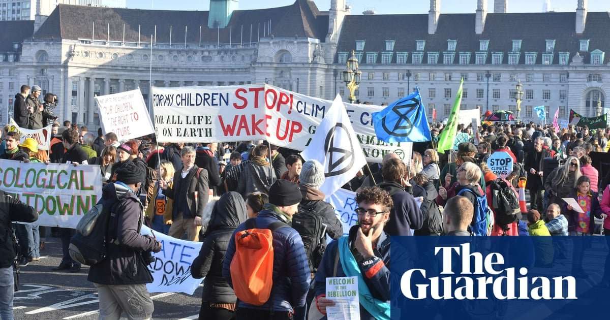 image for Thousands gather to block London bridges in climate rebellion