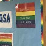 image for At first glance, the white lettering on this Pride poster at my high school blends in with the yellow background. Changes the meaning drastically.