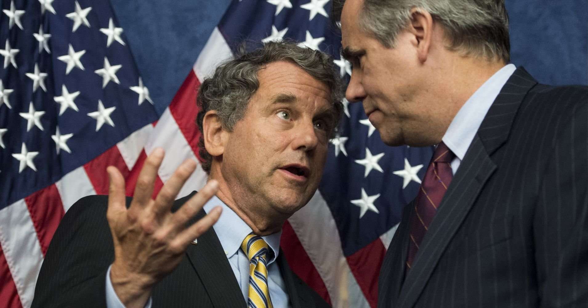 image for Sherrod Brown, Jeff Merkley want to block lawmakers from buying, selling stock