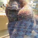 image for This near life size sculpture of a gorilla made entirely of colored pencils.