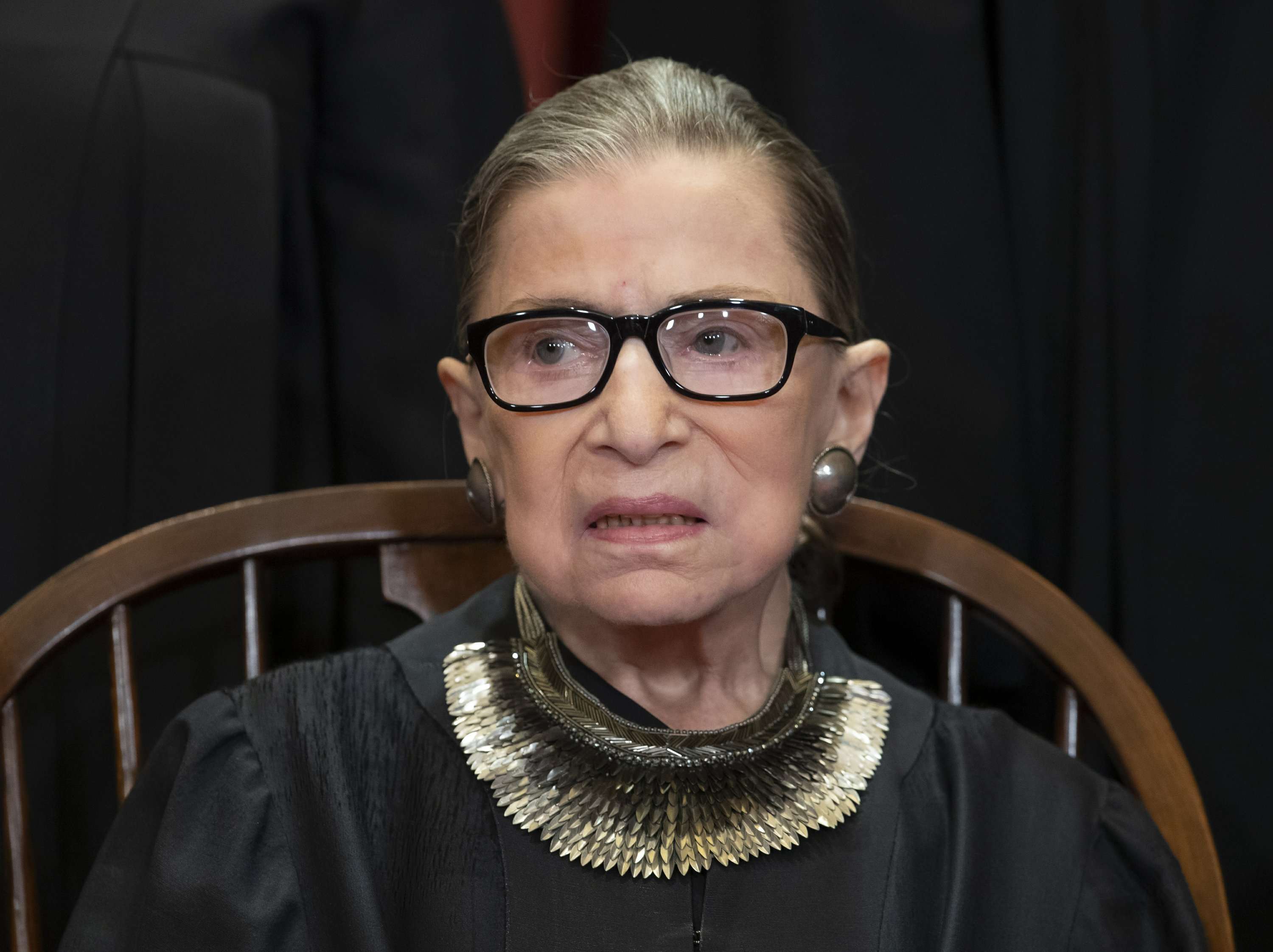 image for Ginsburg misses Supreme Court arguments for the 1st time