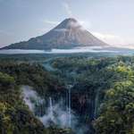 image for Tumpak Sewu waterfalls and Semeru volcano in the background, Indonesia. BY Filippo Cesarini, [1080x1349]