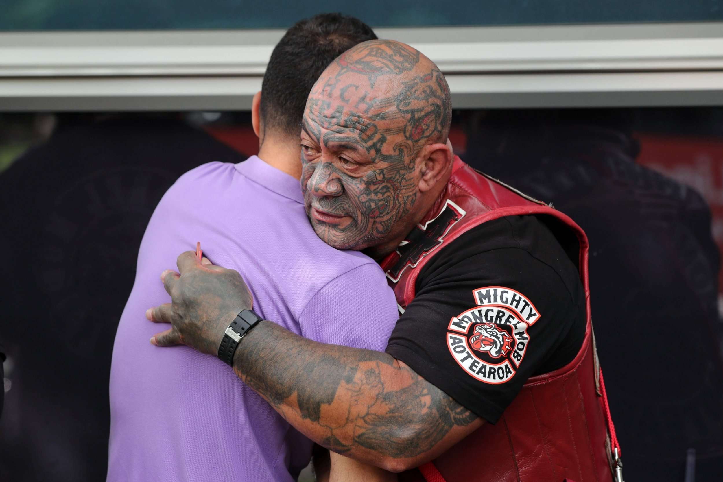 image for Biker gangs stand guard outside NZ mosques during first Friday prayer since massacre
