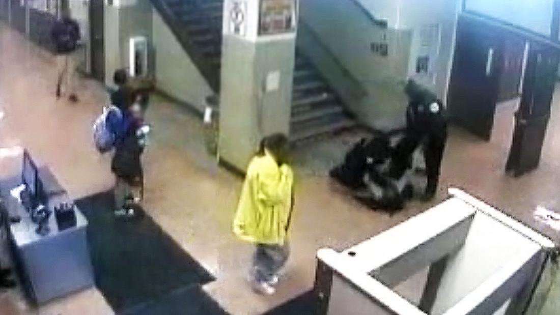 image for Video shows Chicago officers punching and dragging a 16-year-old girl down the stairs