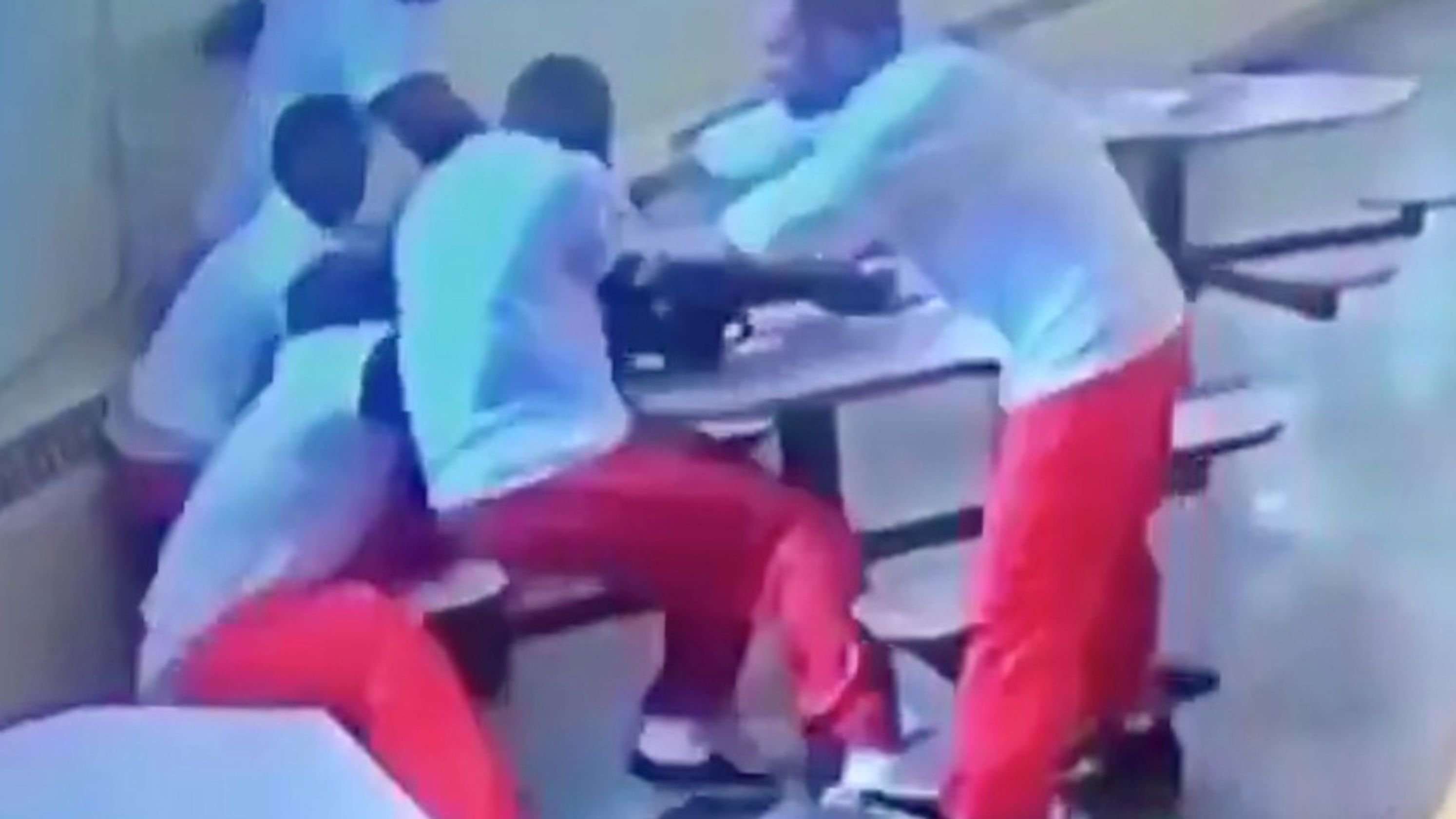 image for Ohio guards laughed as supremacist stabbed cuffed black inmates, suit says