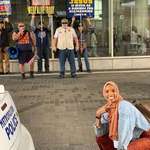 image for This Muslim woman took a photo In front of an anti-Muslim protest like a pro.
