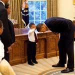 image for Ten years ago today (May 8, 2009) a young boy wanted to know if his hair was similar to then President Obama's. "Touch it, dude!" the President responded and this photo was taken.