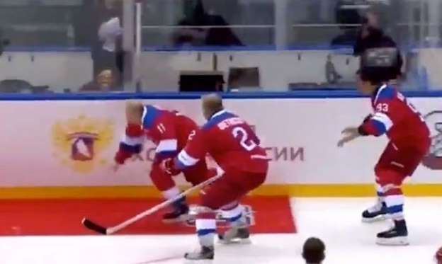 image for Putin falls flat on his face while waving to crowd at all-star ice hockey game
