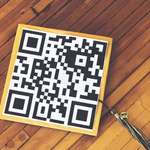 image for A teen decorated her graduation cap with a giant QR code that directs people to a list of students killed in school shootings.