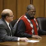image for Picture of Kwame Ajamu being told he is a free man by a judge, after being falsely imprisoned for 27 years.