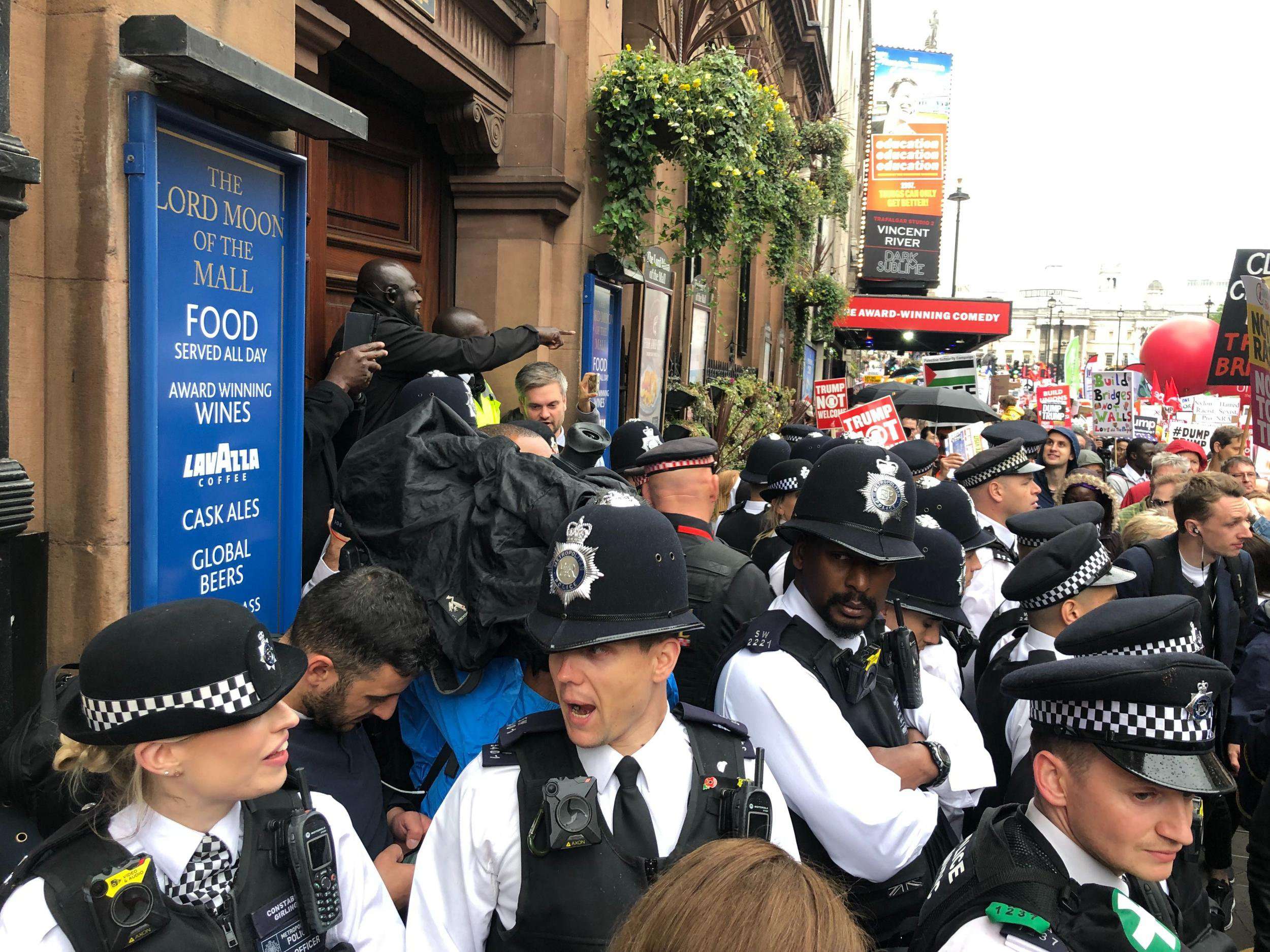 image for Trump supporters barricaded in Wetherspoons by police as protesters chant ‘Nazi scum off our streets’