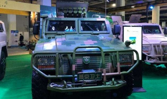 image for China Unveils New Armoured Vehicle Capable Of Launching 12 Suicide Drones