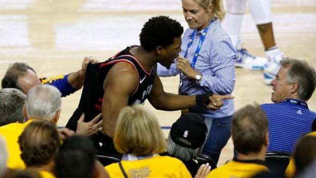 image for Warriors part-owner who shoved Raptors' Lowry fined $500K, banned 1 year | CBC Sports