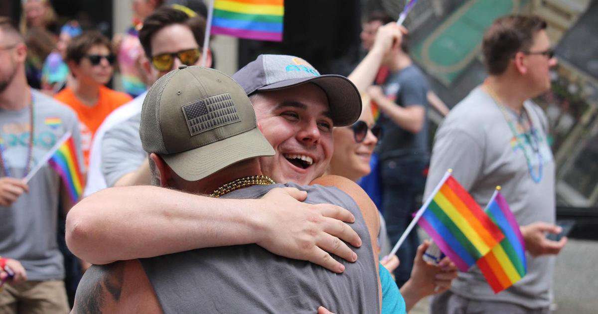 image for Dad hugs strangers at Pittsburgh Pride parade and brings marchers to tears