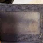 image for My dad has had the same wallet for so long his driver's license photo is imprinted on the plastic.