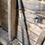 image for Renovating a 100 year old house, found what looks like a samurai sword under a section of the house that had a dirt floor. The sheath is metal on the outside and wood inside. Still sharp and heavy.