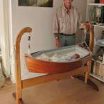 image for Grandpa makes an amazing cradle for his grandson.