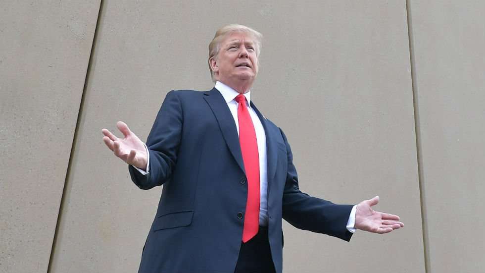 image for Judge blocks Trump from using billions in military funds for border wall