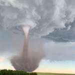 image for My aunt took this picture of a tornado at my grandparents farm that touched down yesterday. South Dakota.