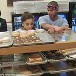 image for Woman could face 20 years for licking ice cream, but here’s a pic of Ariana Grande licking a donut