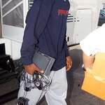 image for 2003, a rookie LeBron James traveling with his PS2