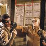 image for During the 'Watchmen' (2009) opening credits, the original Nite Owl rescues Thomas and Martha Wayne from a mugger outside the Gotham Opera House, preventing the need for Bruce Wayne to become Batman in this universe.