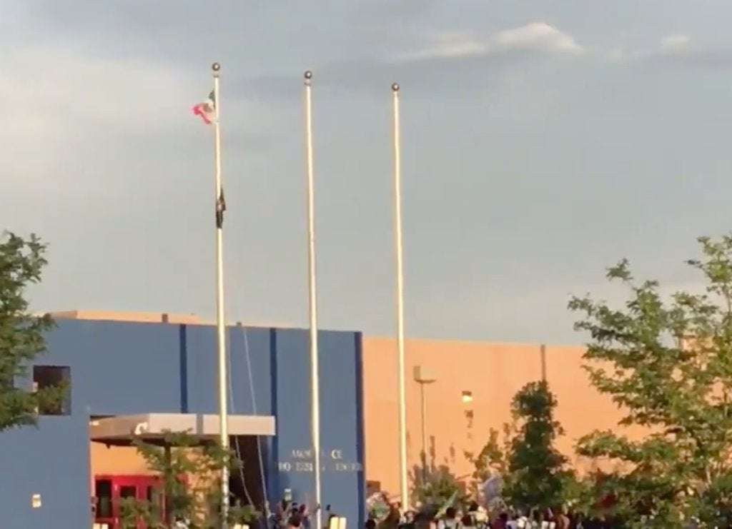 image for WATCH: Protesters at ICE facility in Aurora pull down American flag and raise Mexican flag