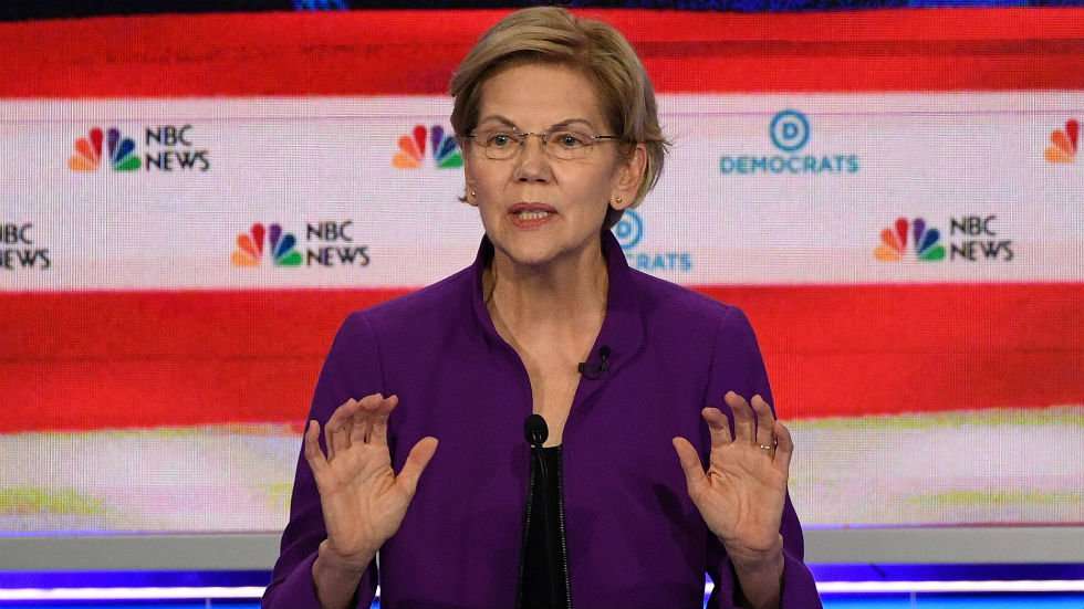 image for Warren pledges to create commission to investigate 'crimes committed by the United States against immigrants'