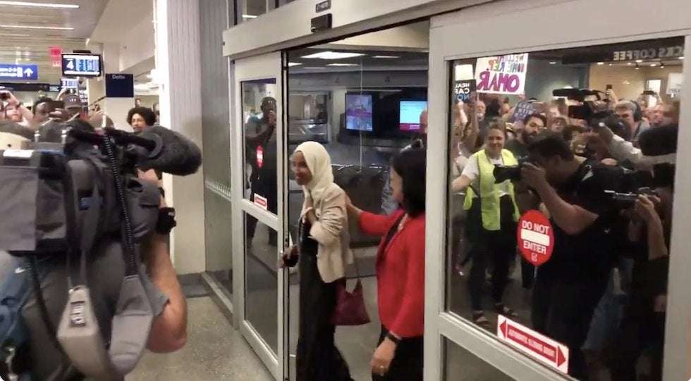 image for Crowd chanting 'welcome home Ilhan' greets Omar at airport