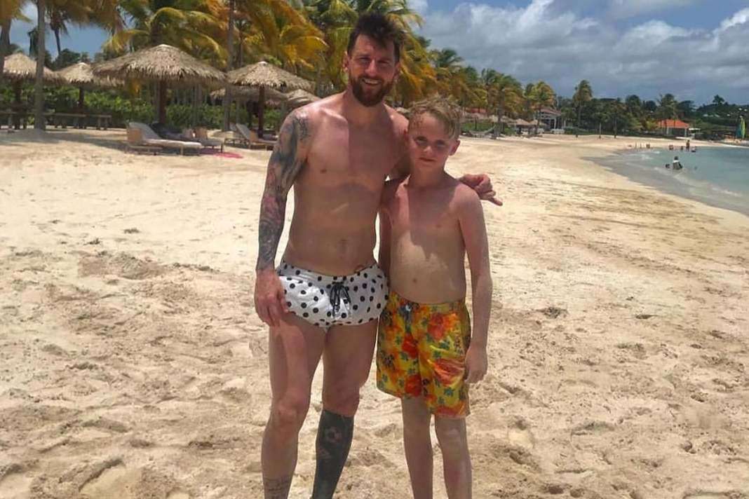 image for Lionel Messi has kickabout with London boy, 11, on beach in Antigua