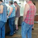 image for Too many sleeveless plaid shirted men in this Canadian McDonalds