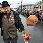 image for WW2 Vet walking alone on Victory Day. He is the last of his squad