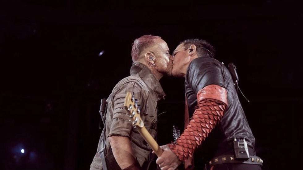 image for Rammstein's guitarists kiss onstage during Russia performance to protest anti-LGBTQ laws