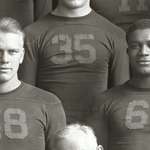 image for Future President Gerald Ford with teammate Willis Ward at the University of Michigan in 1934. Ford threatened to quit the team when Ward was benched for a game against Georgia Tech, who at the time refused to play against black players.