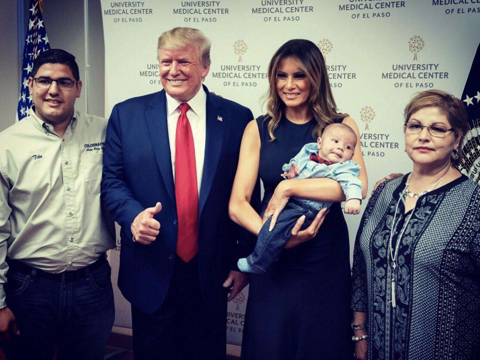 image for Grinning Trump gives thumbs-up with baby whose parents were shot dead in El Paso terror attack