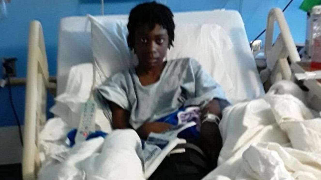 image for Illinois Cop Shot Unarmed Black 12-Year-old in Bed During Botched Raid: Lawsuit