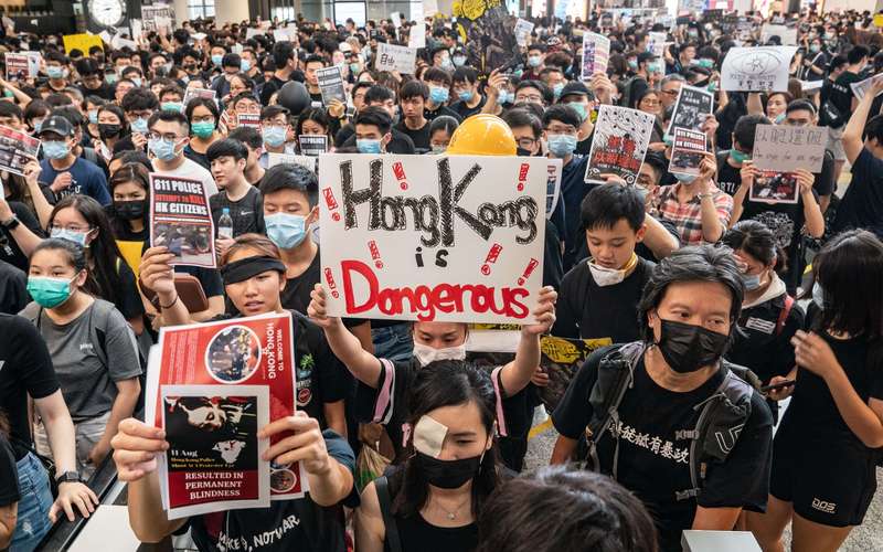 image for China media says Hong Kong protesters are 'asking for self-destruction' as military assembles nearby