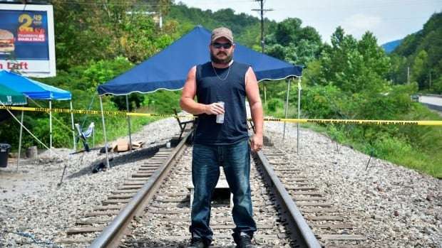image for Unpaid Kentucky coal miners have been blocking a train track for 3 weeks